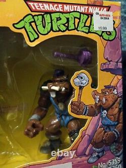 Teenage Mutant Ninja Turtles RARE vintage Cave-beast Bebop with weapons & box