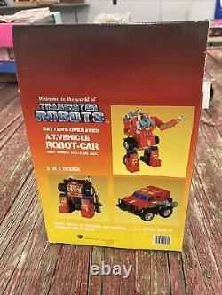 NEUF DANS LA BOÎTE ! Robots à transistors A. T. vintage et rare de 1985 Véhicule Robot-Car