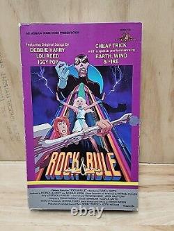 VHS ROCK & RULE vintage en grande boîte avec couverture rabattable, rare de 1983 NELVANA MGM/UA