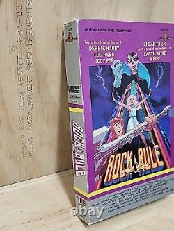 VHS ROCK & RULE vintage en grande boîte avec couverture rabattable, rare de 1983 NELVANA MGM/UA