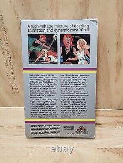 VHS ROCK & RULE vintage en grande boîte avec couverture rabattable, rare de 1983 NELVANA MGM/UA